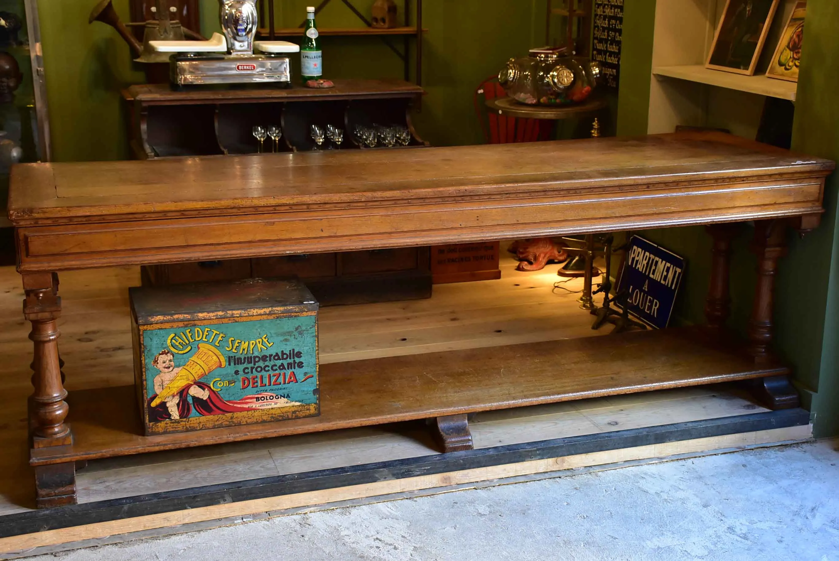 Antique French oak drapery table from a silk boutique