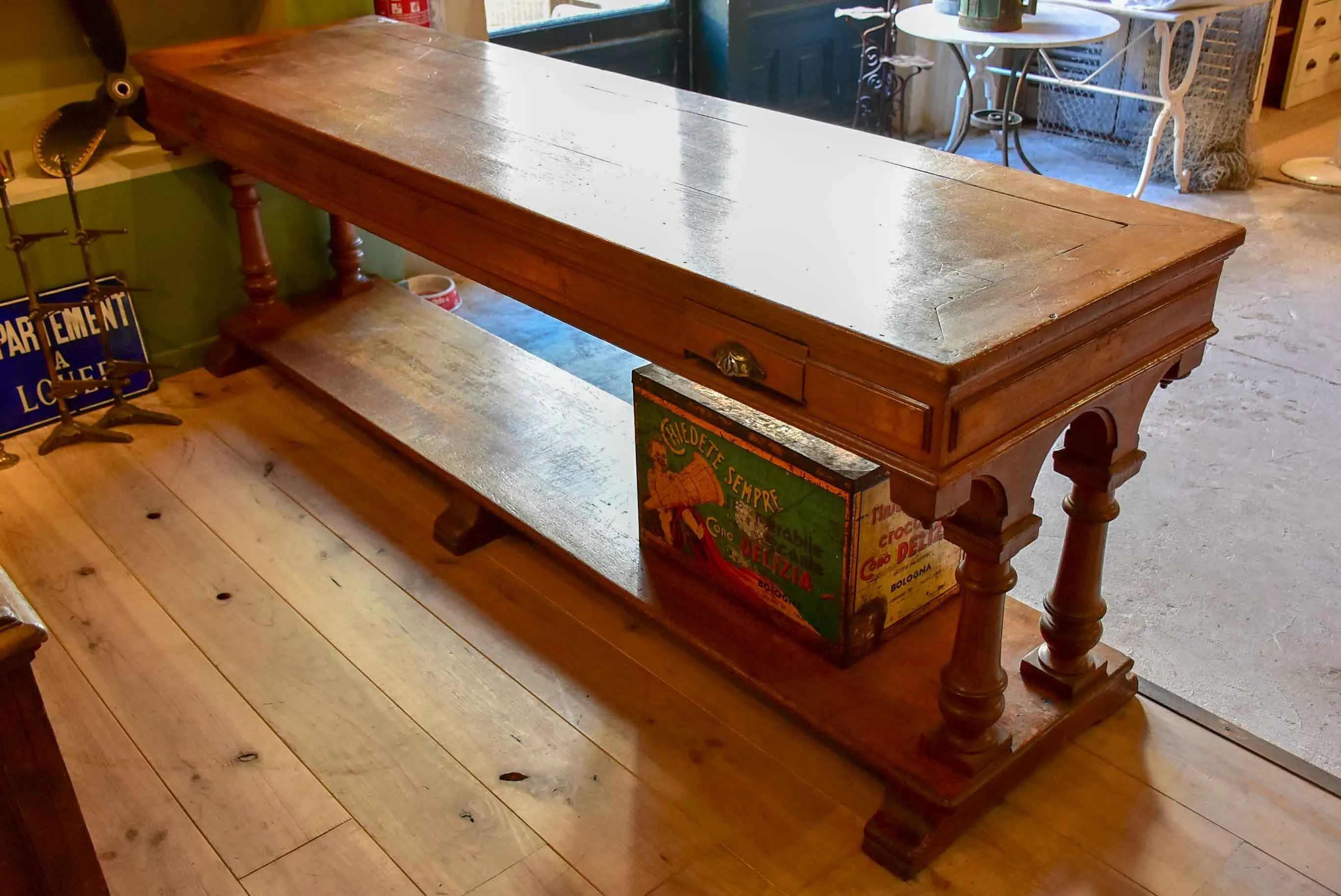 Antique French oak drapery table from a silk boutique
